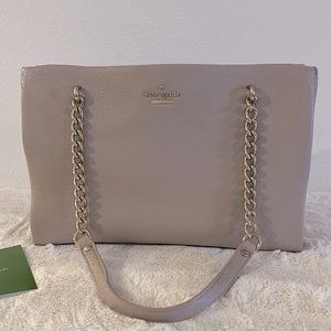 Kate Spade tan over the shoulder purse. Only wore once for a beach wedding.
